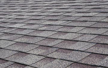 Heddle tiles for shallow pitch roofing